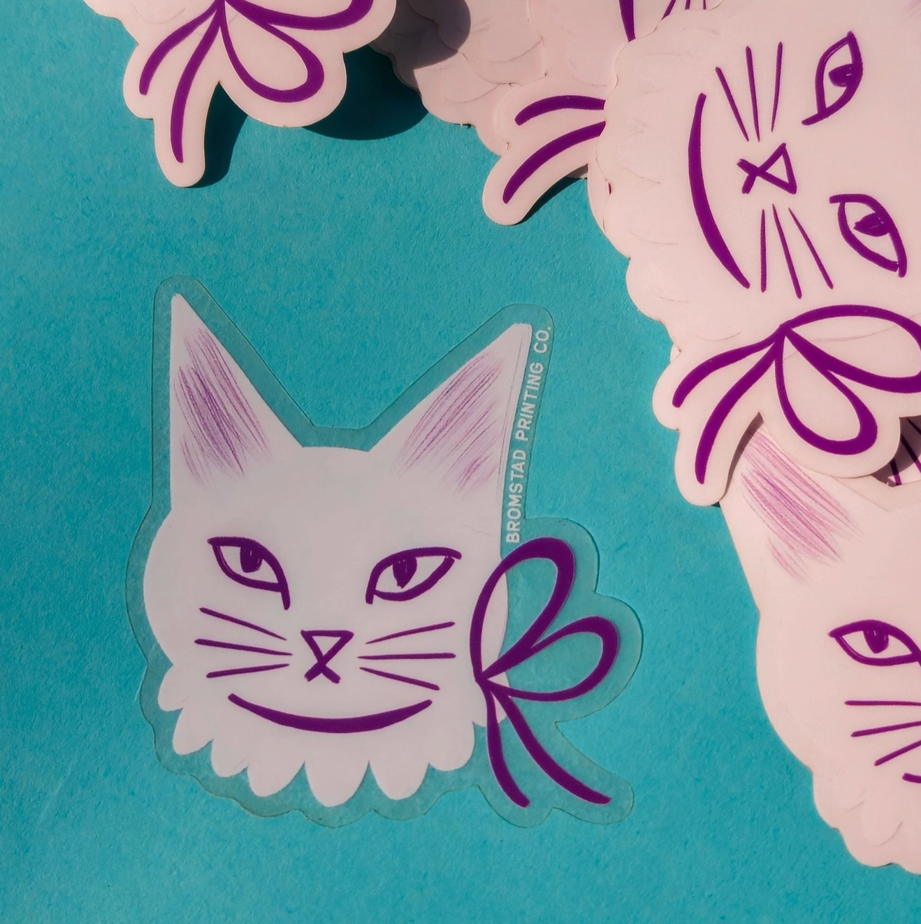 BROMSTAD PRINTING Ribbon Cat Clear Sticker